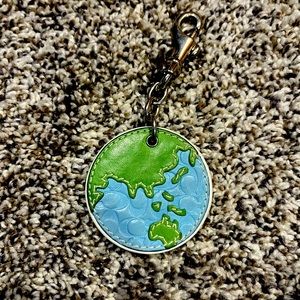 Coach Earth charm